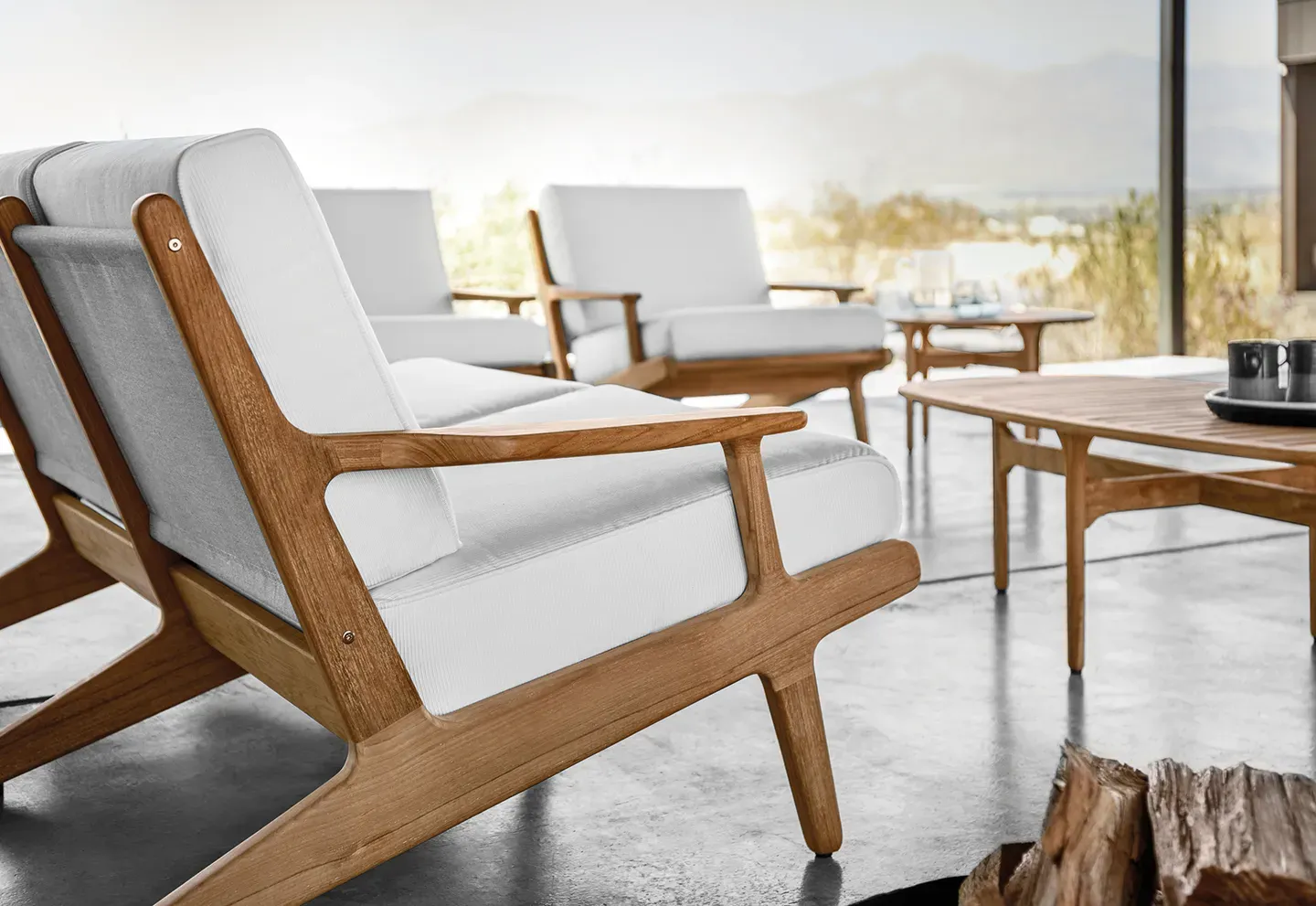 bay sofa, lounge chairs and coffee table on terrace